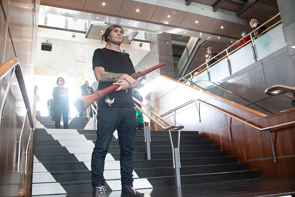 Shane James holding a Pūkāea